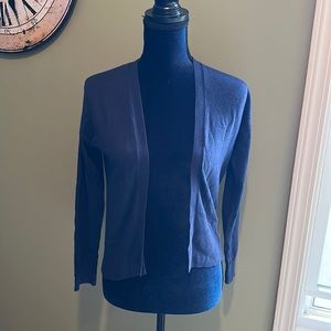 Girl’s cardigan sweater.